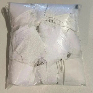 1 pounds of white on white  quilting fabric in‎ pre-cut 2 inch squares